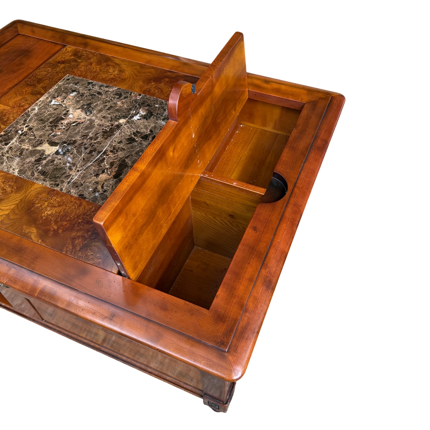 Close-up of marble insert set within a burl veneered top on coffee table