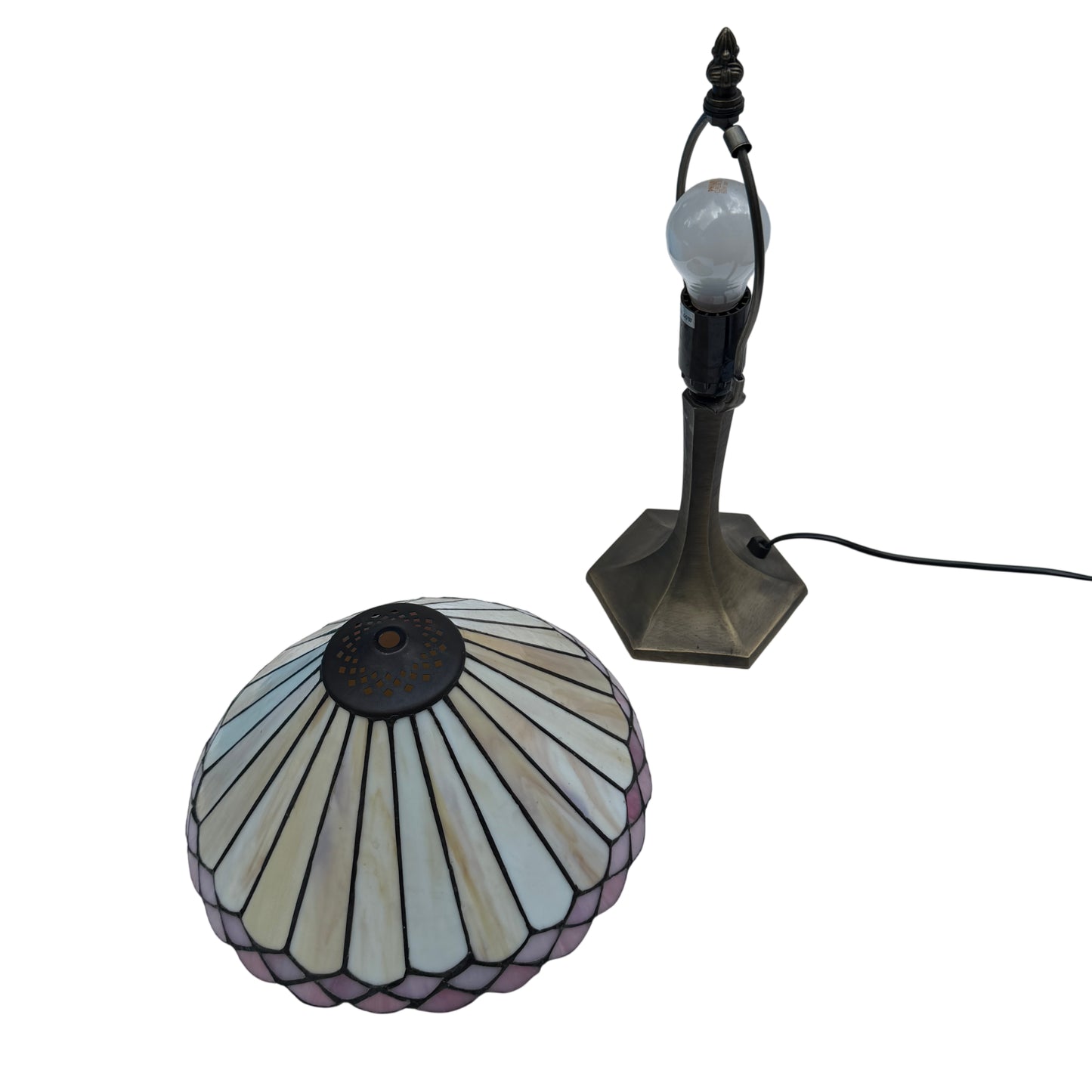 Close photograph showing soldered lead came joints on a Tiffany-style lamp shade