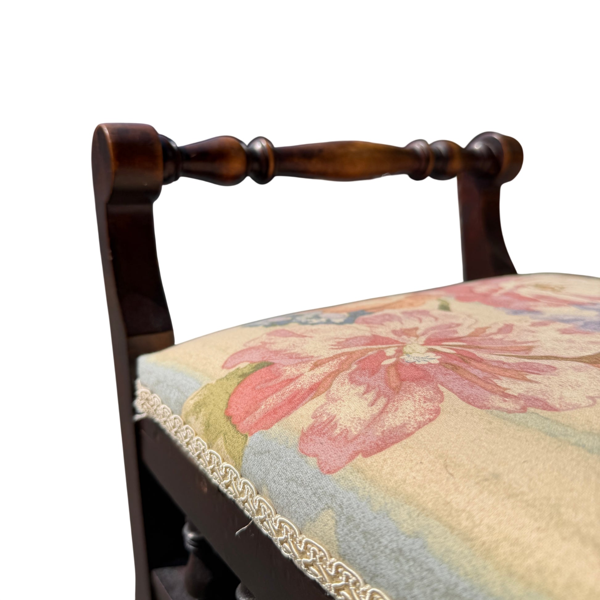 Detail of turned wooden handle and spindle on a Victorian stool