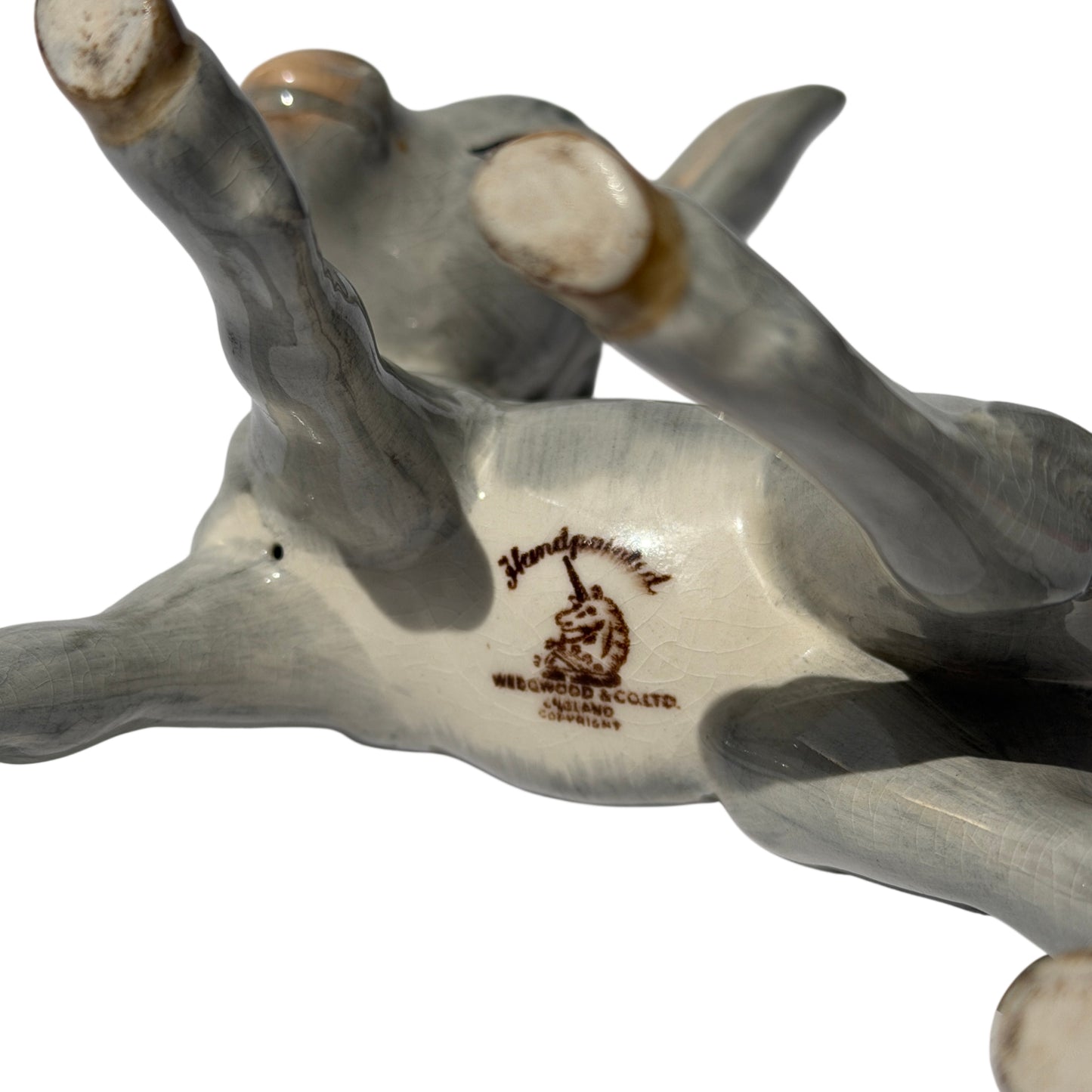 Close-up of the donkey foal head showing painted eye detail on Wedgwood figurine