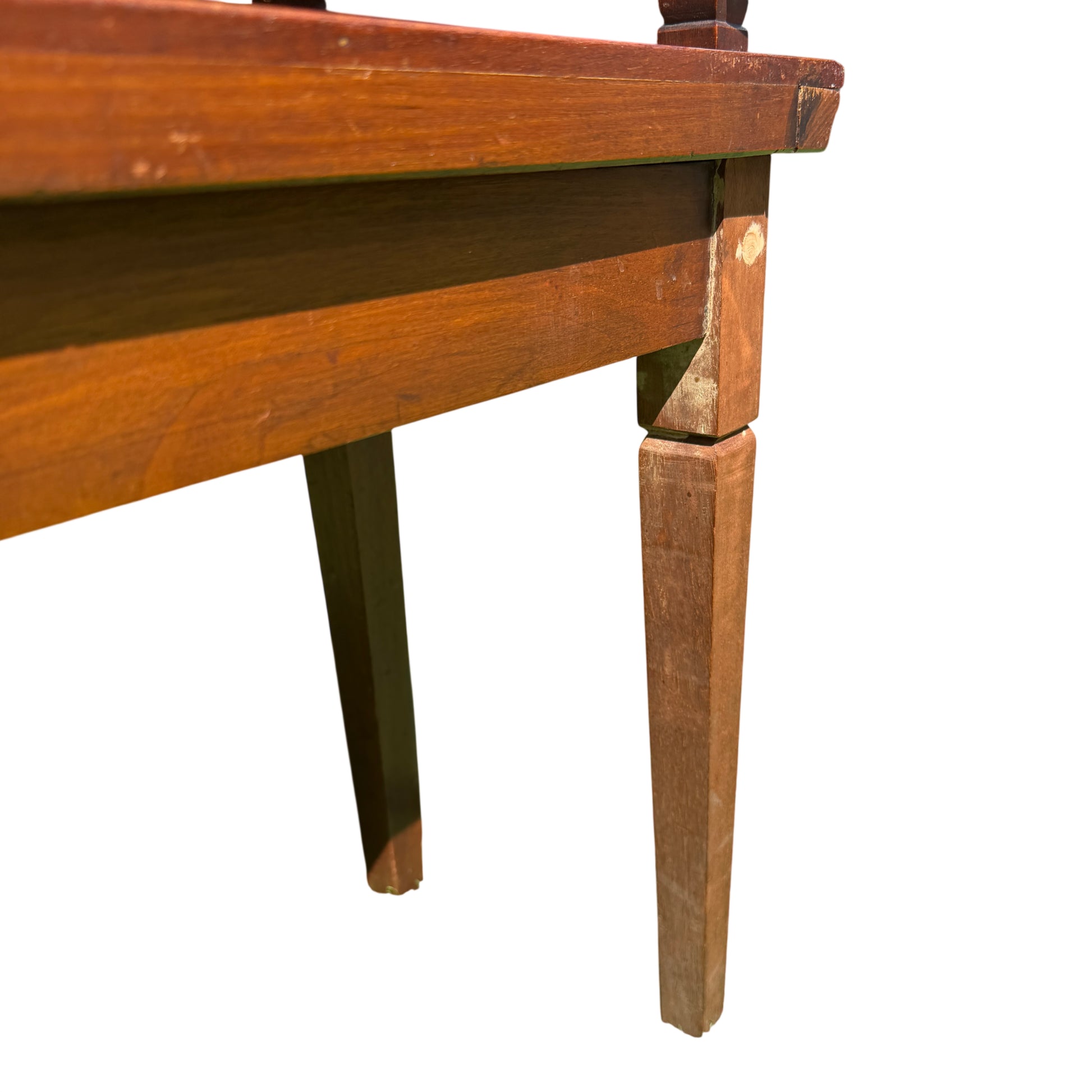 Rear corner of mahogany serving table showing join and past repair