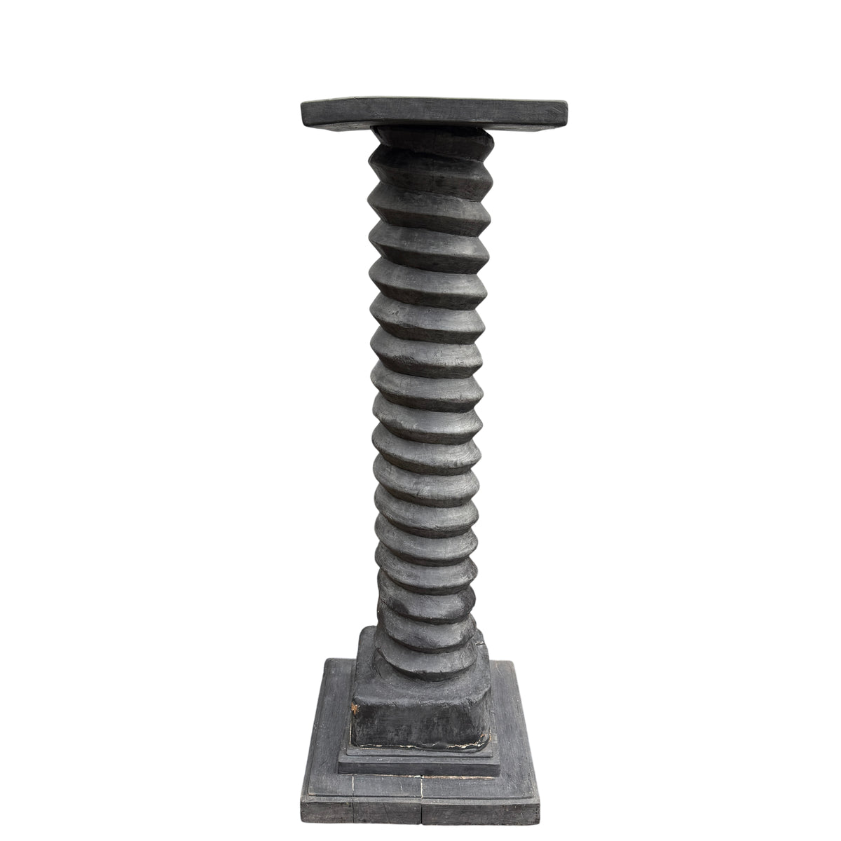 Spiral carved timber column pedestal repurposed from a wine press with square top
