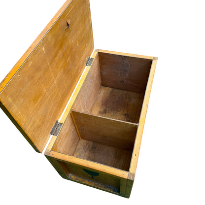Top view of compartmented pine storage chest with stencilled lettering