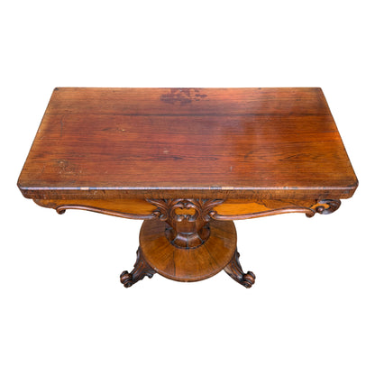 Top edge with veneer loss and front edge chips on walnut table