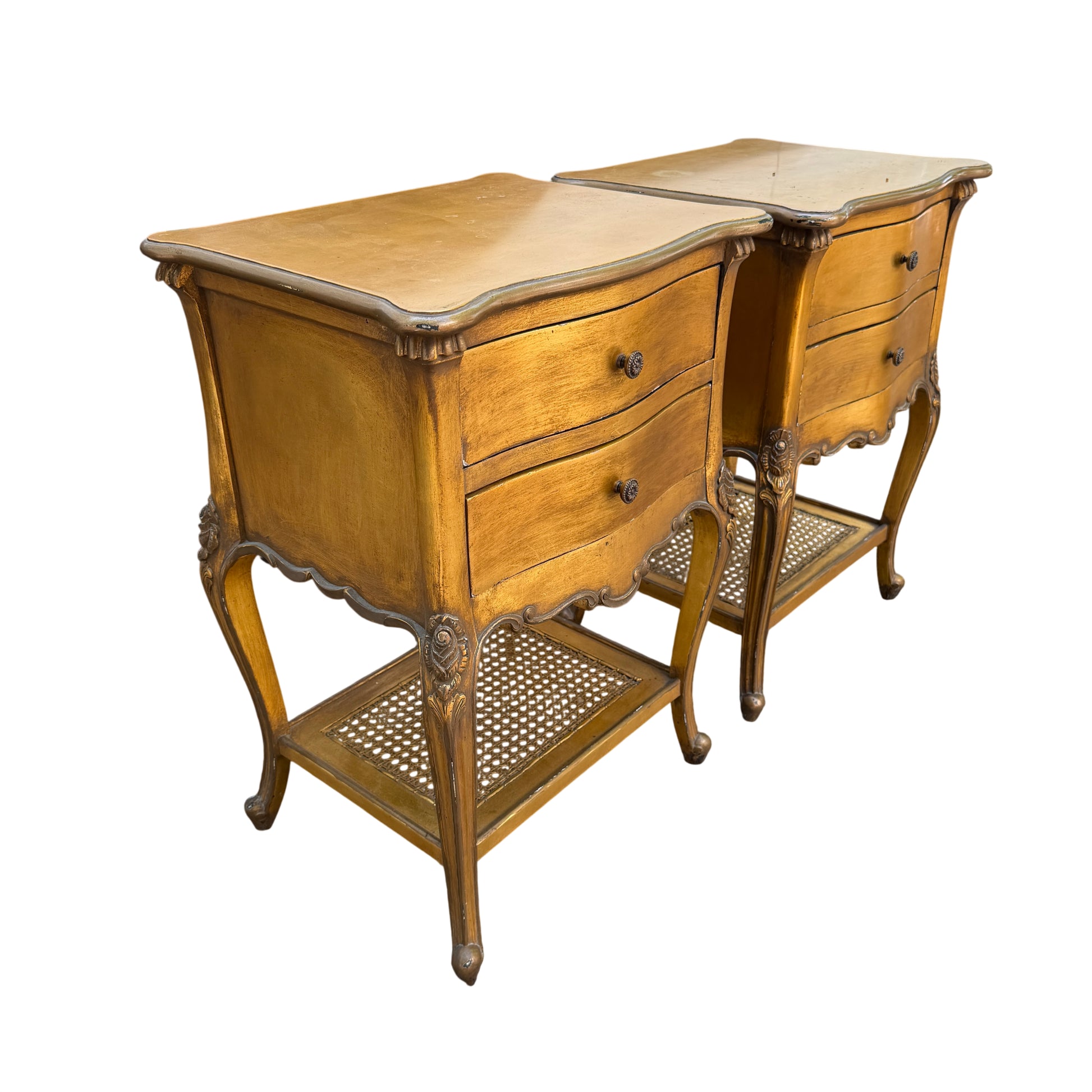 Top view of gold bedside cabinets showing gilt painted tops and edge trim