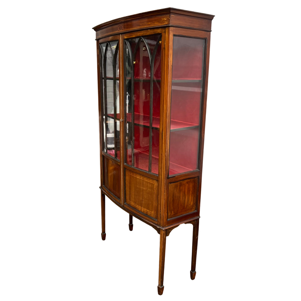Inlaid mahogany display cabinet with leaded glass panels and red fabric lining