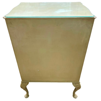 Antique-style painted bedroom chest with decorative gilt highlights