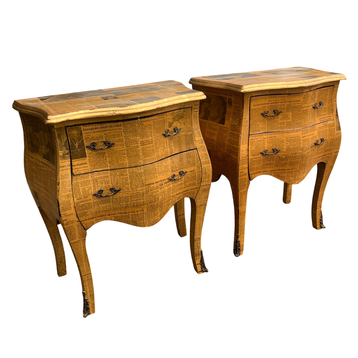 Pair of vintage newspaper decoupage bombe bedside cabinets with gilt-edge tops and metal handles