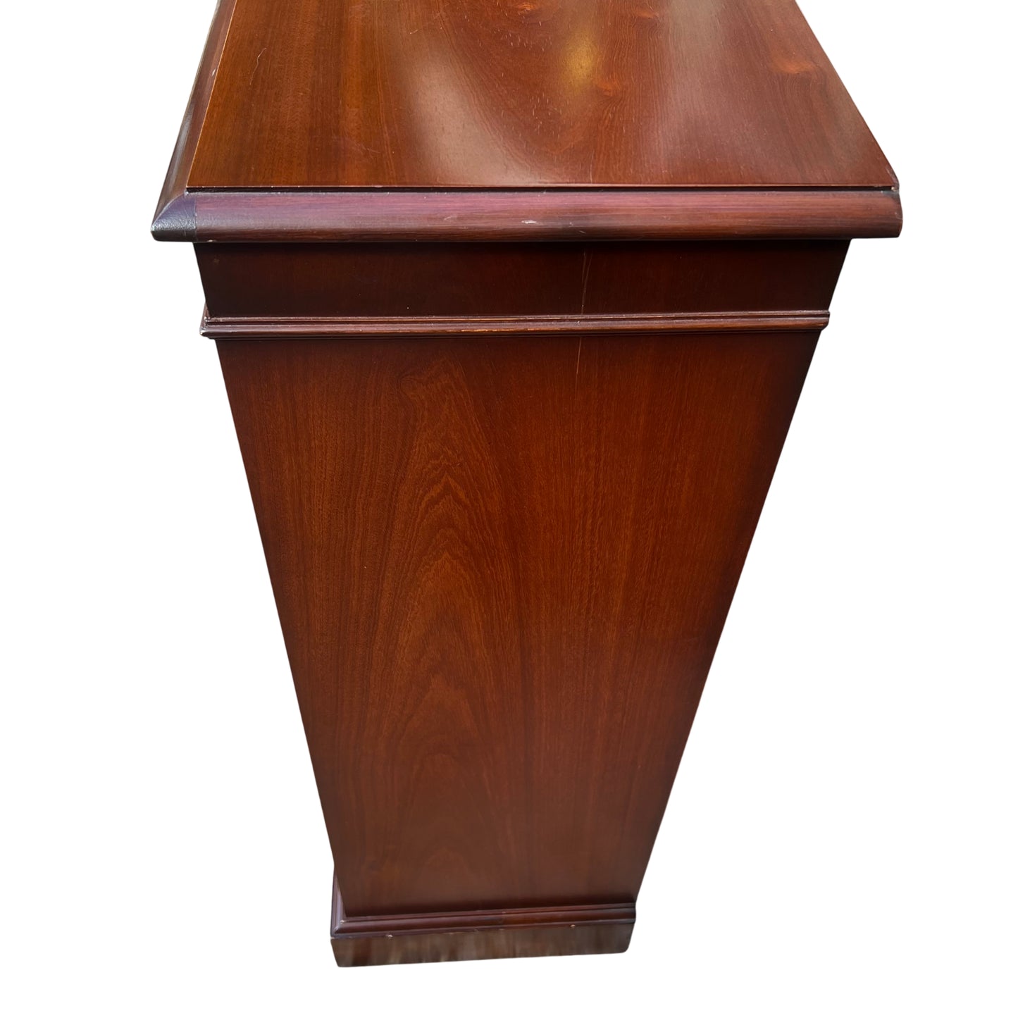 Interior shelves of vintage mahogany shelving unit, adjustable positions visible