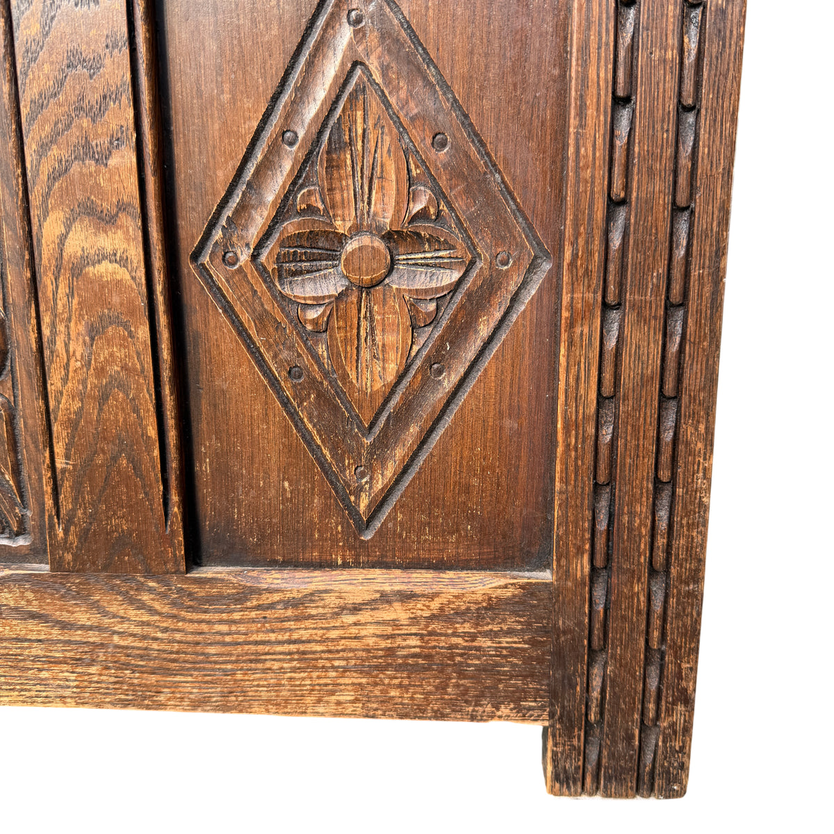 Top view of oak blanket chest showing recessed boarded lid and oak grain