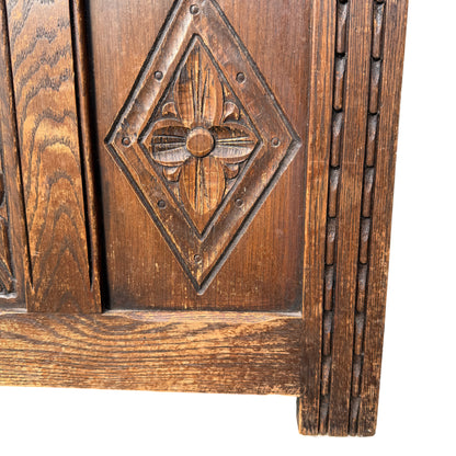 Top view of oak blanket chest showing recessed boarded lid and oak grain