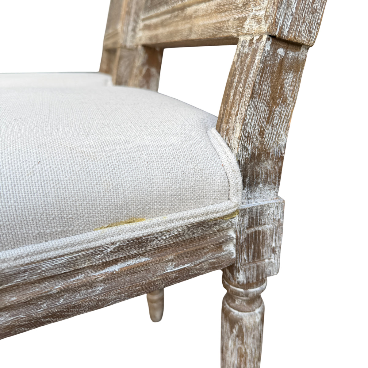 Set of two upholstered dining chairs with turned legs and distressed finish