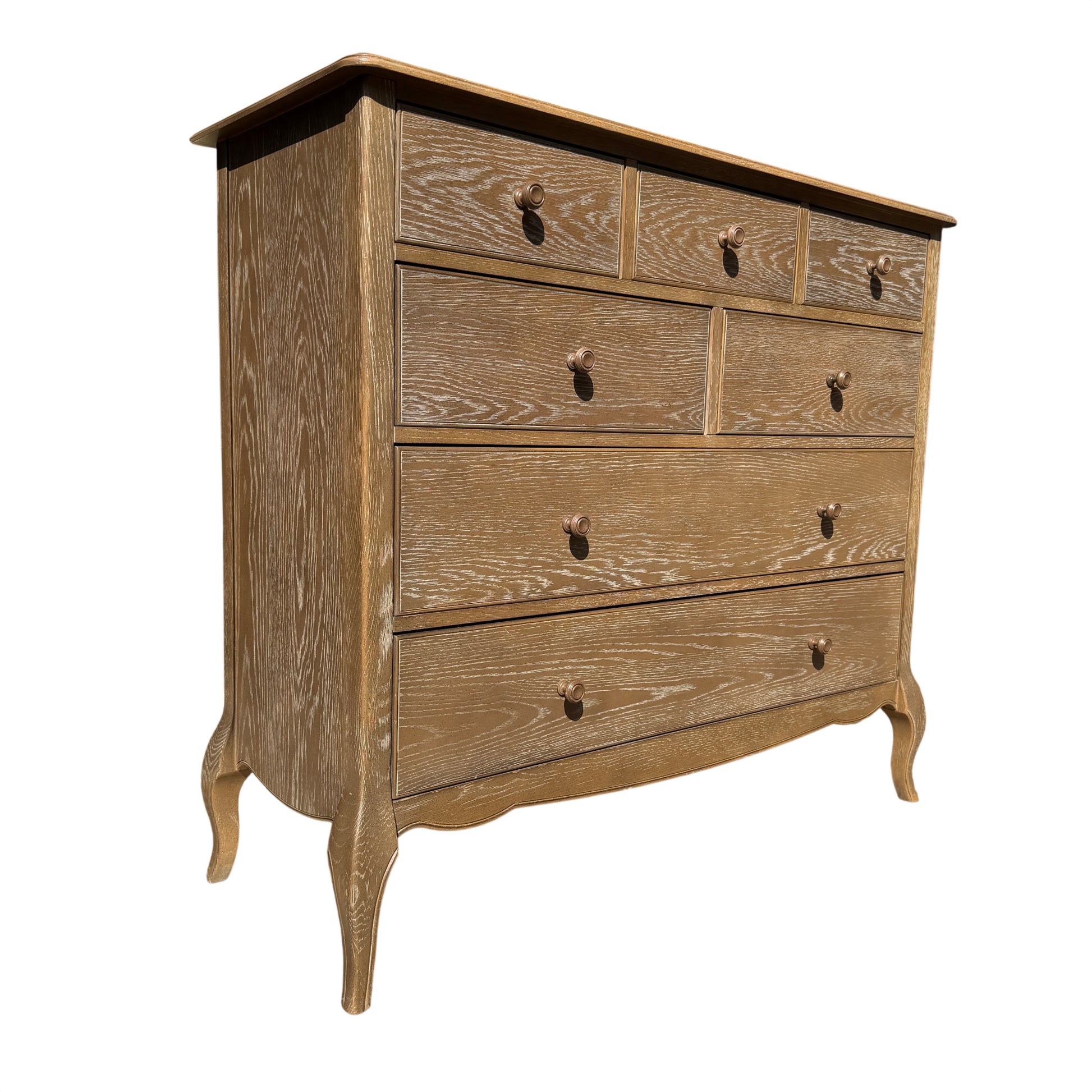 Contemporary oak-effect five-drawer chest of drawers with whitewashed grain finish and round knobs