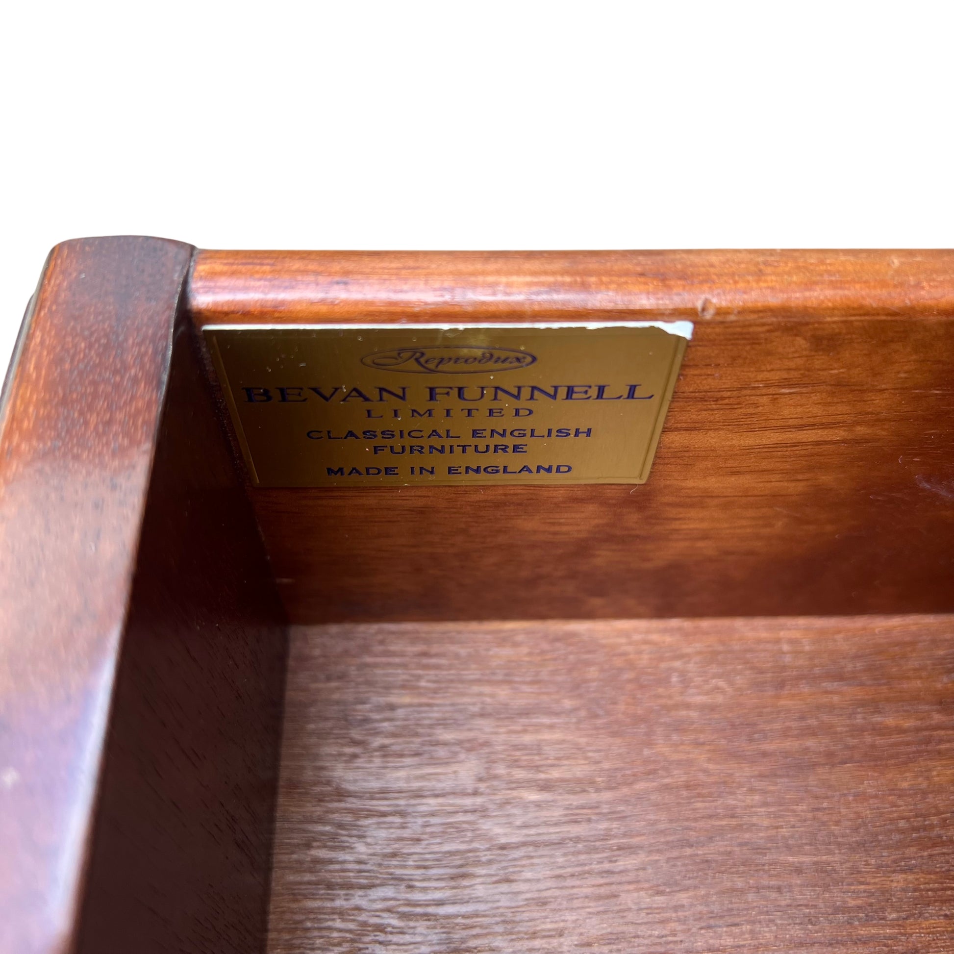 Lower section showing bracket feet and base moulding on mahogany chest