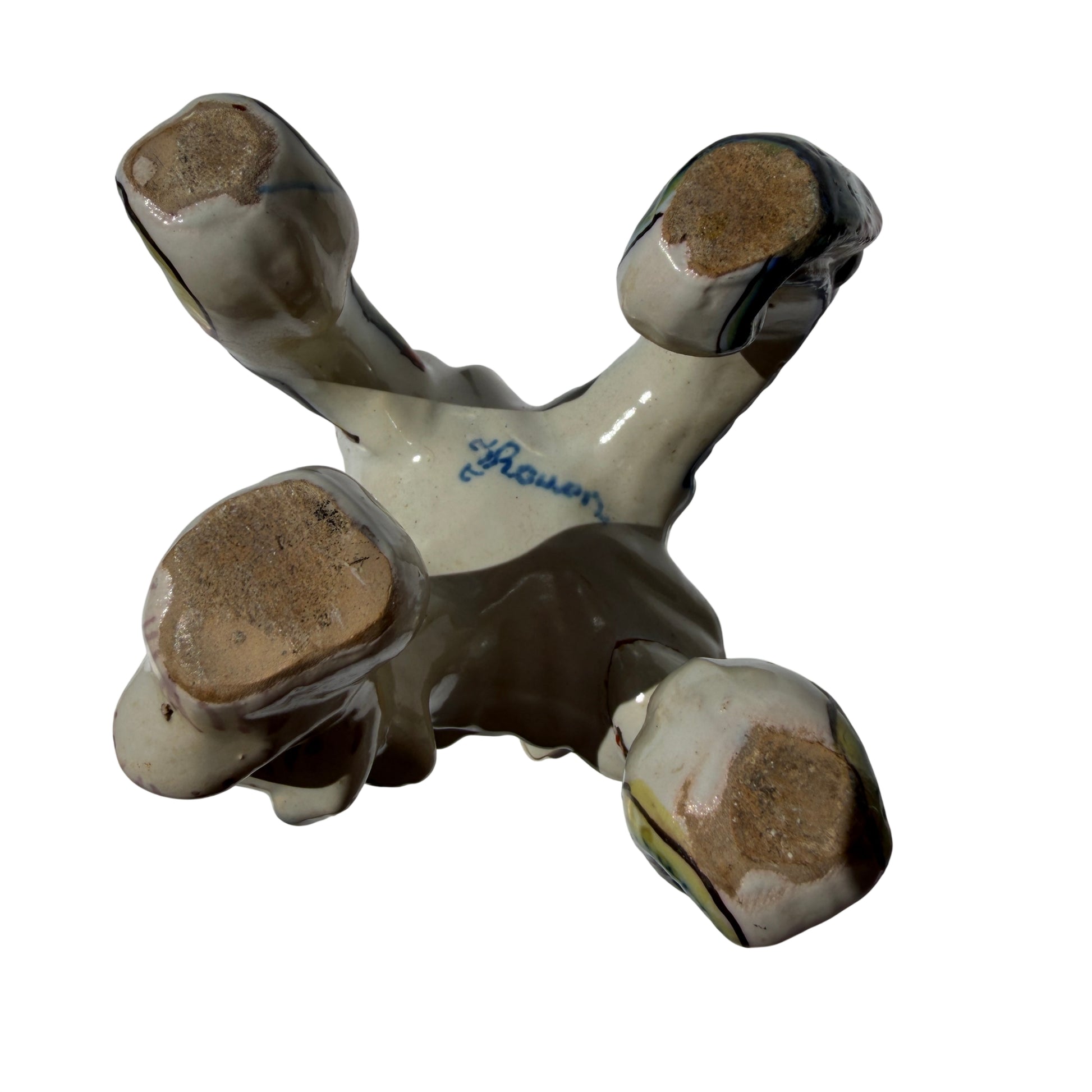 Top view showing scalloped rim and painted decoration on ceramic candlestick