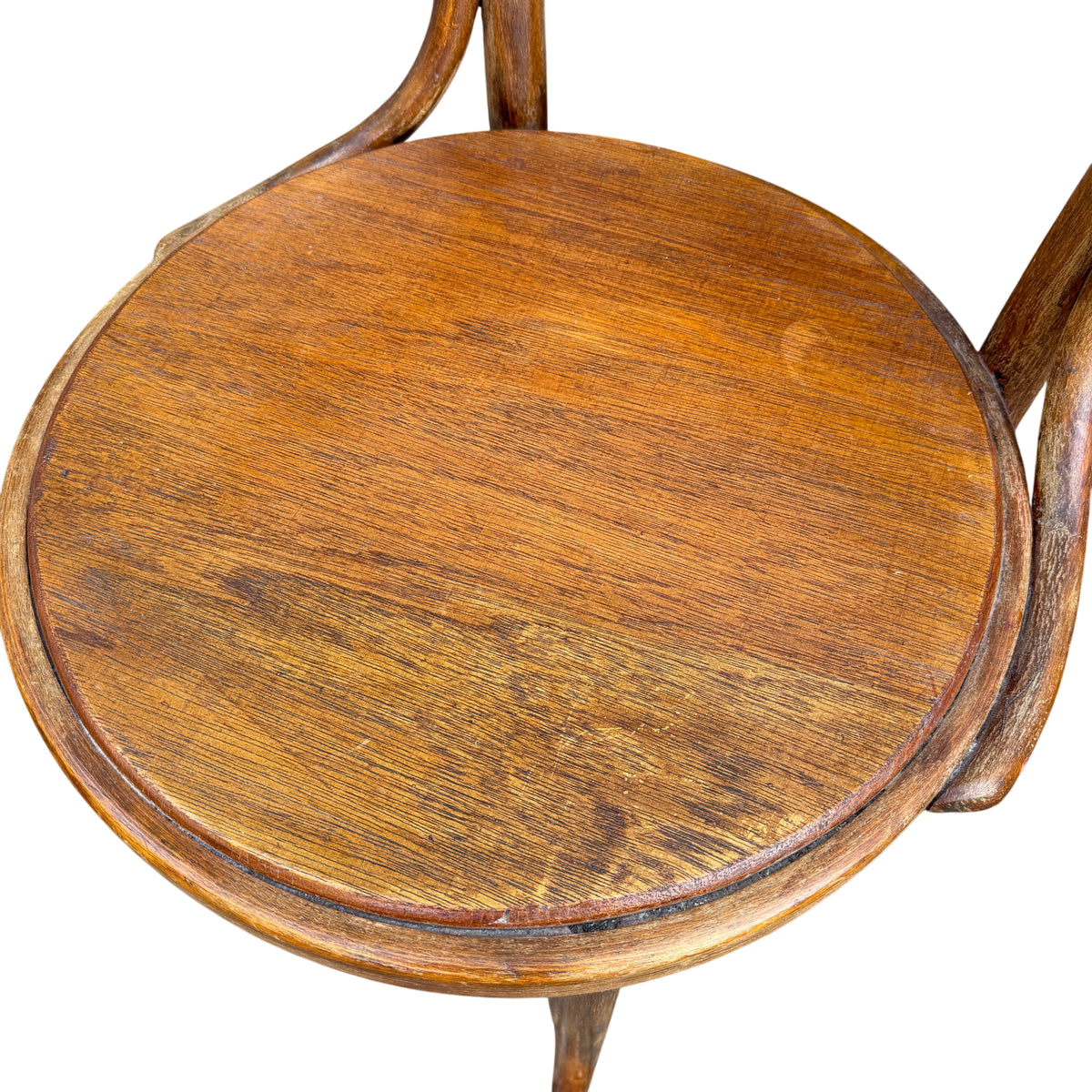 Round wooden seat of a vintage bentwood dining chair
