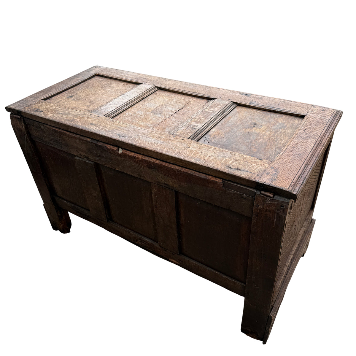 Overhead view of oak coffer lid showing panel construction and surface wear