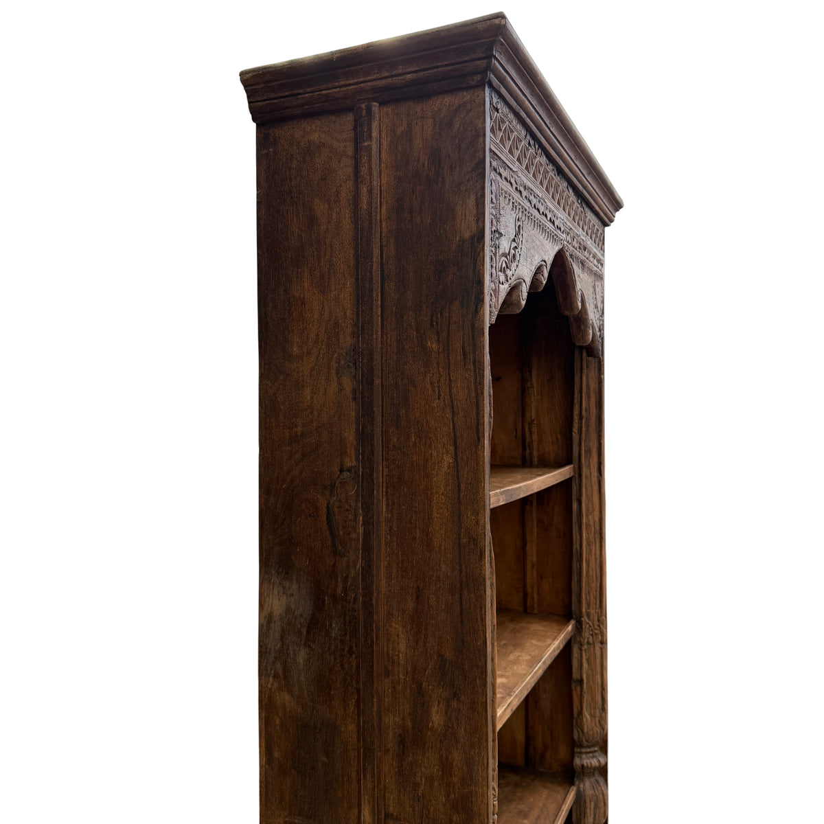 Interior view of oak bookcase shelves and boarded back panels