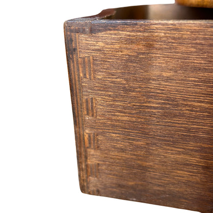Lower drawers and cabriole-style legs of mahogany bedside chest