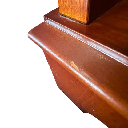 Pair of shallow drawers pulled out in a small pine storage bookcase