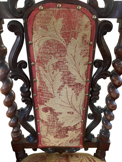 Lower frame detail with carved apron and turned legs on antique walnut chair