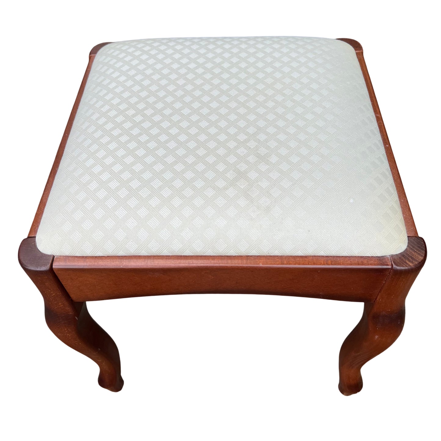 Mid century wooden upholstered stool with cream patterned seat and curved legs