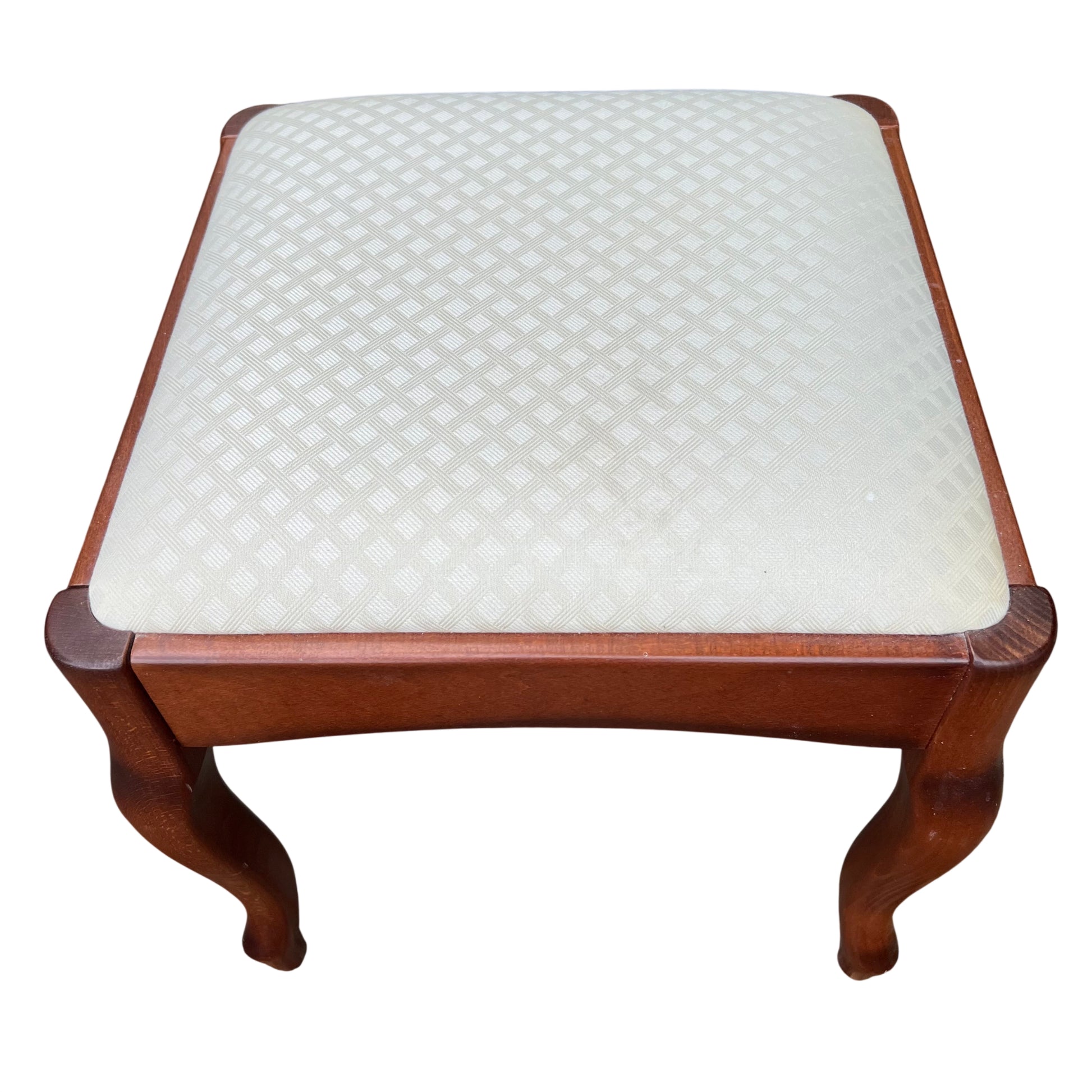 Mid century wooden upholstered stool with cream patterned seat and curved legs