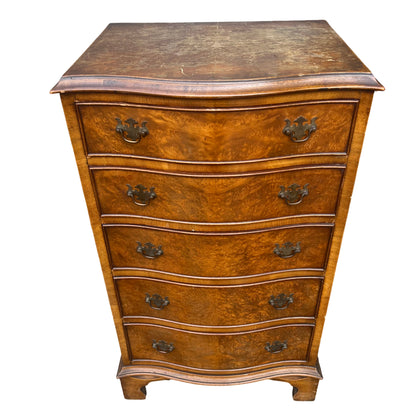 Narrow tallboy chest of drawers in burr walnut veneer with shaped base