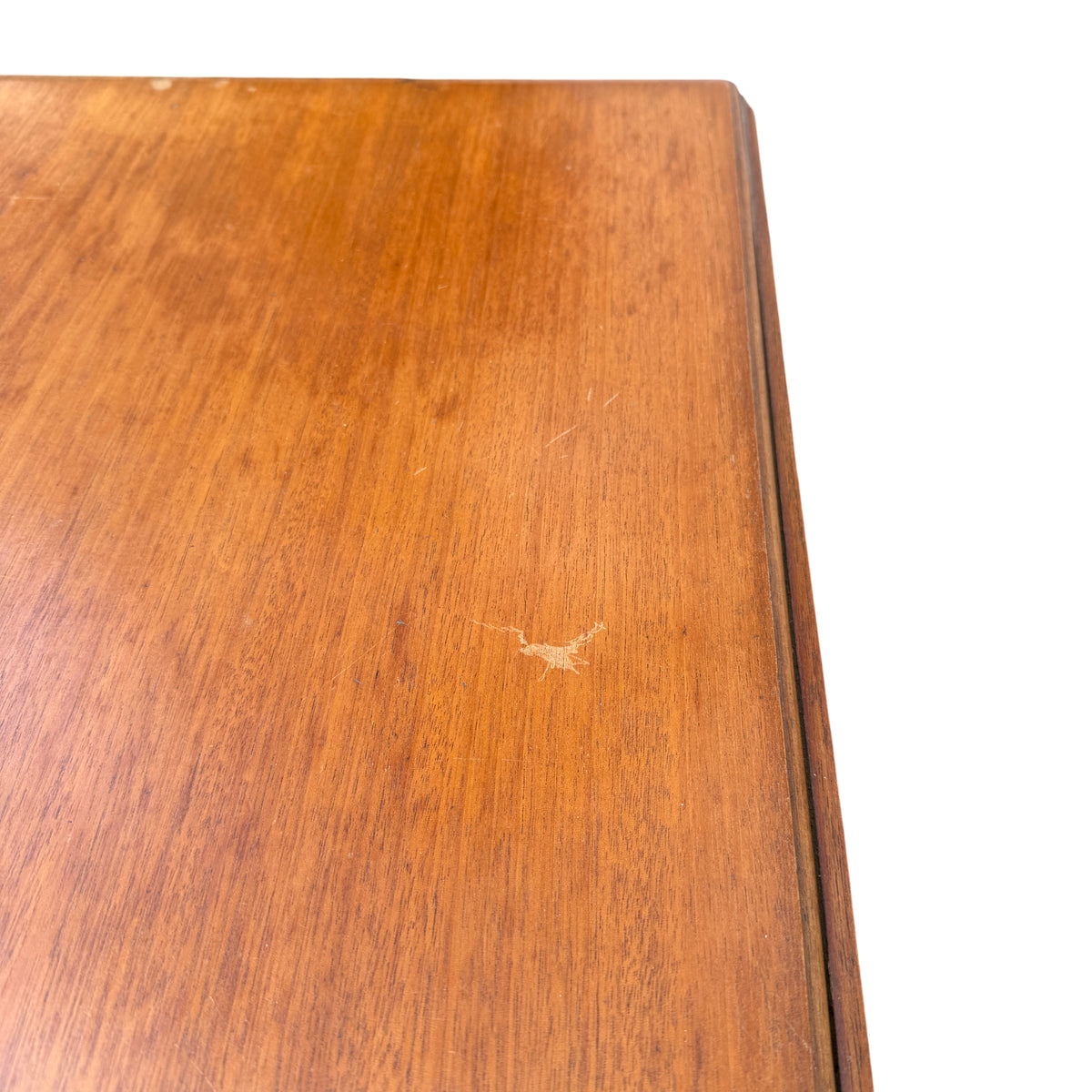 Table with drop leaves lowered showing slim profile and turned legs