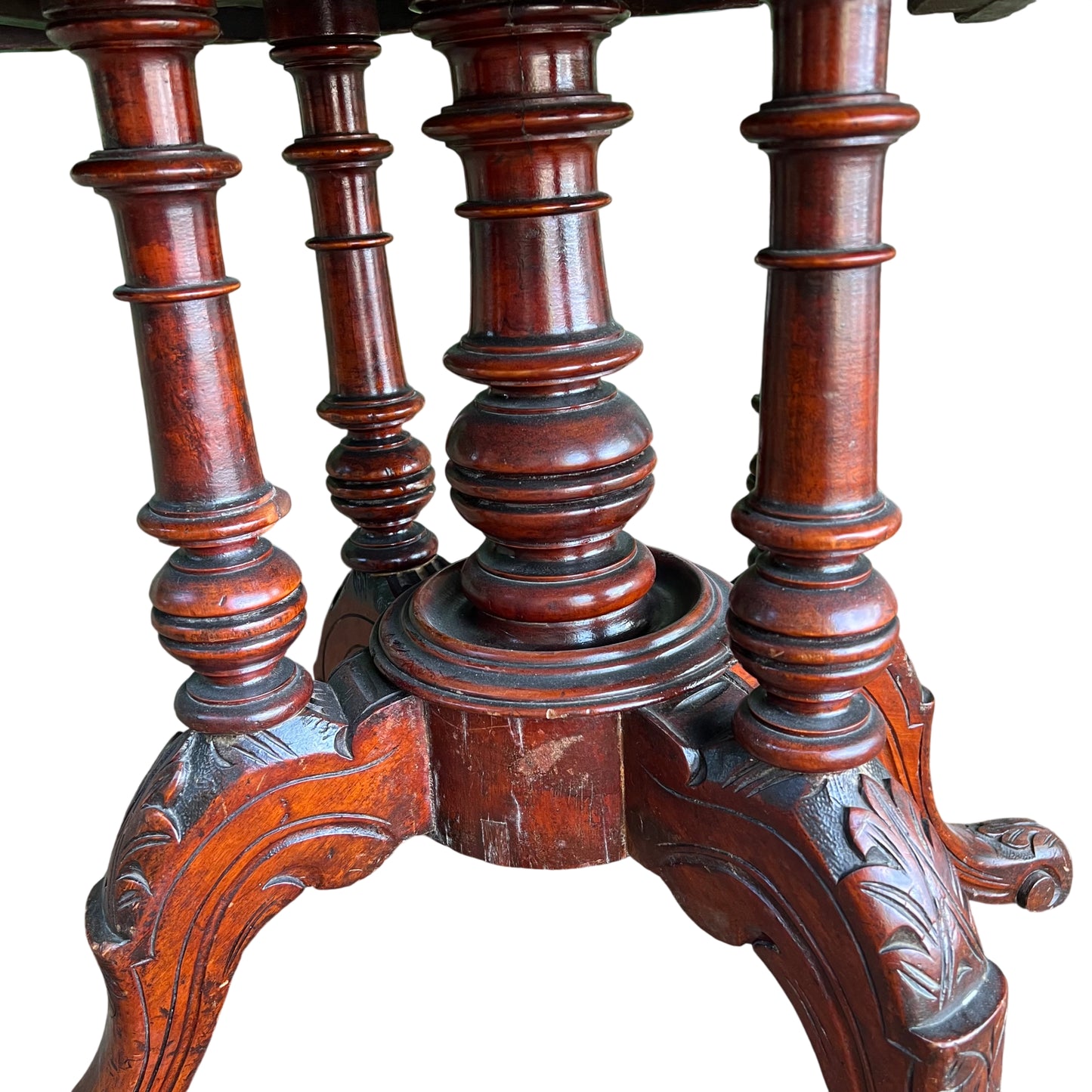 Carved mahogany tripod base and turned column on Victorian table
