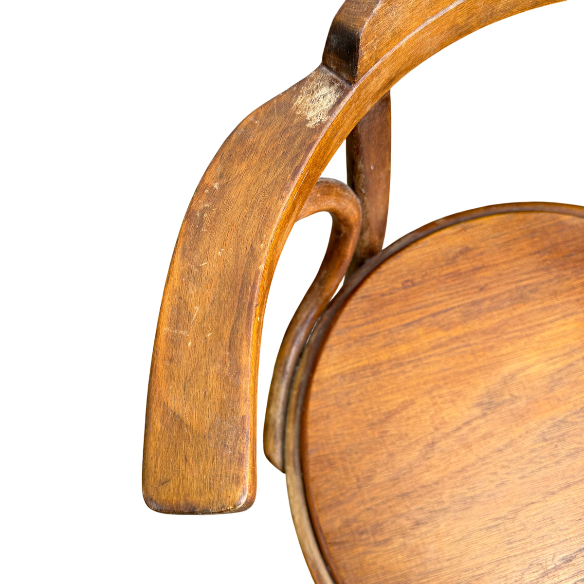 Top view of the curved back rail on a vintage bentwood bistro chair