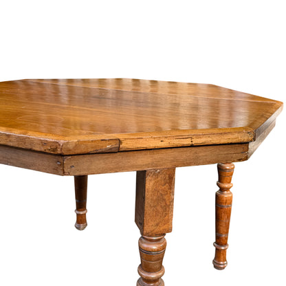 Full view from above of octagonal oak coffee table, warm patina