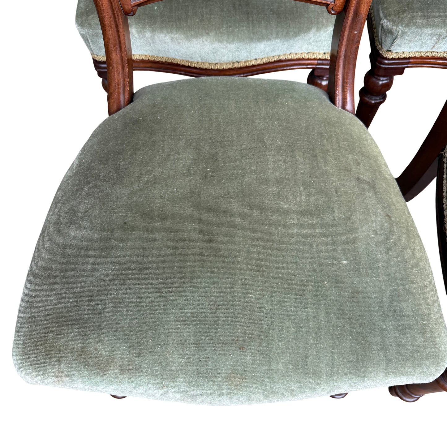 Detail of turned mahogany front leg on a Victorian dining chair