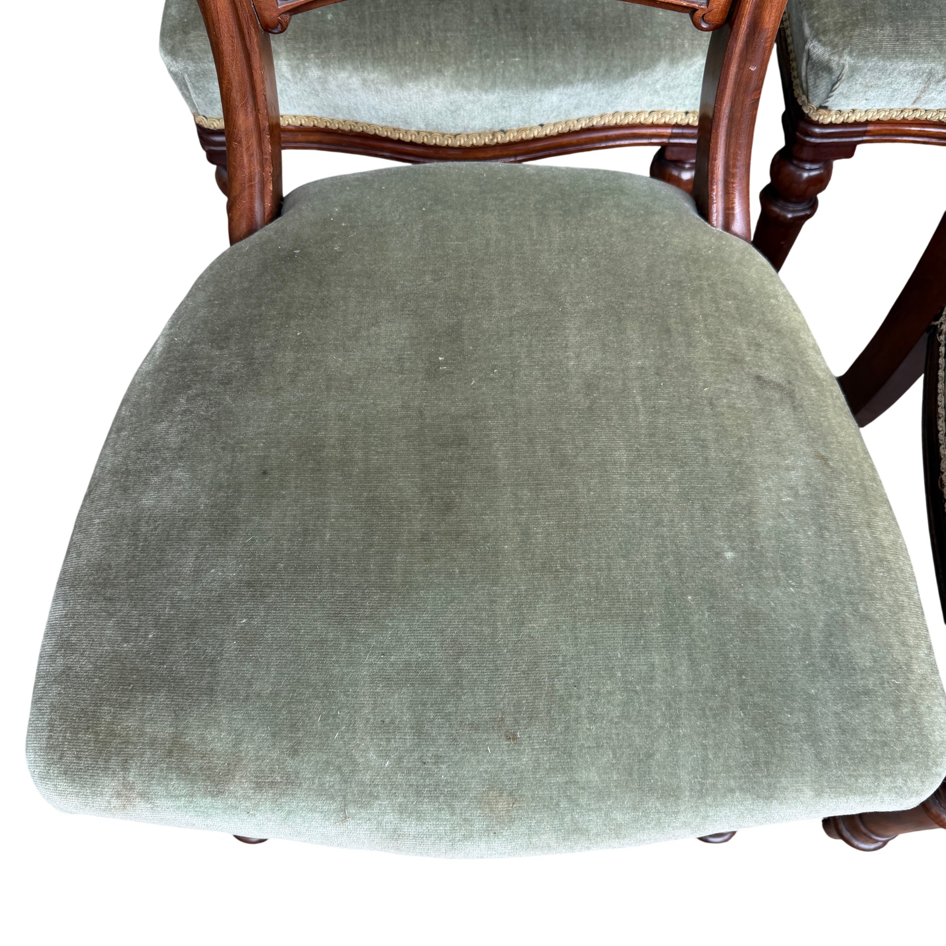 Detail of turned mahogany front leg on a Victorian dining chair