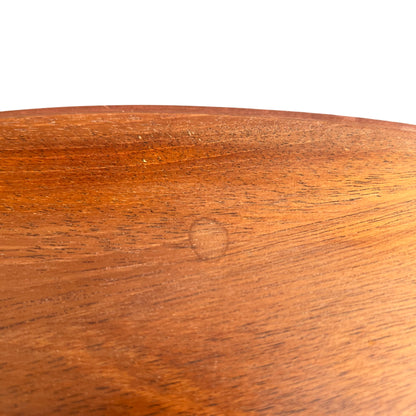 Understated mid century side table with cross stretcher detail
