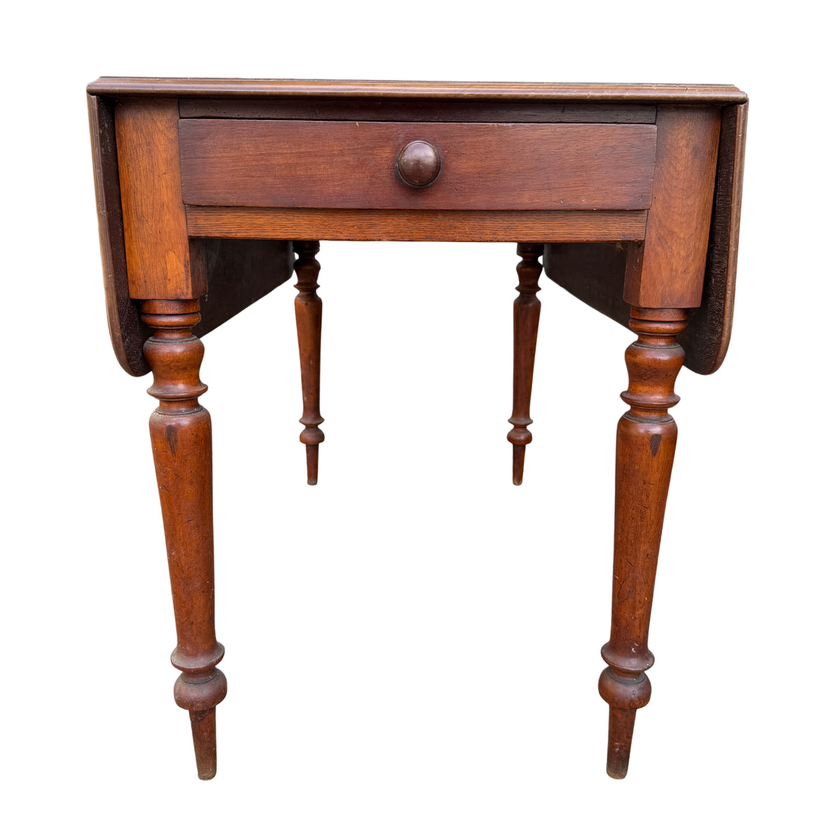 Close-up of drawer and turned leg on Victorian drop-leaf table