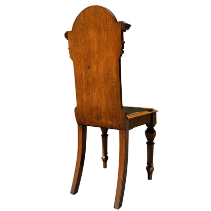 Rear view of oak hall chair back showing panel and moulding detail