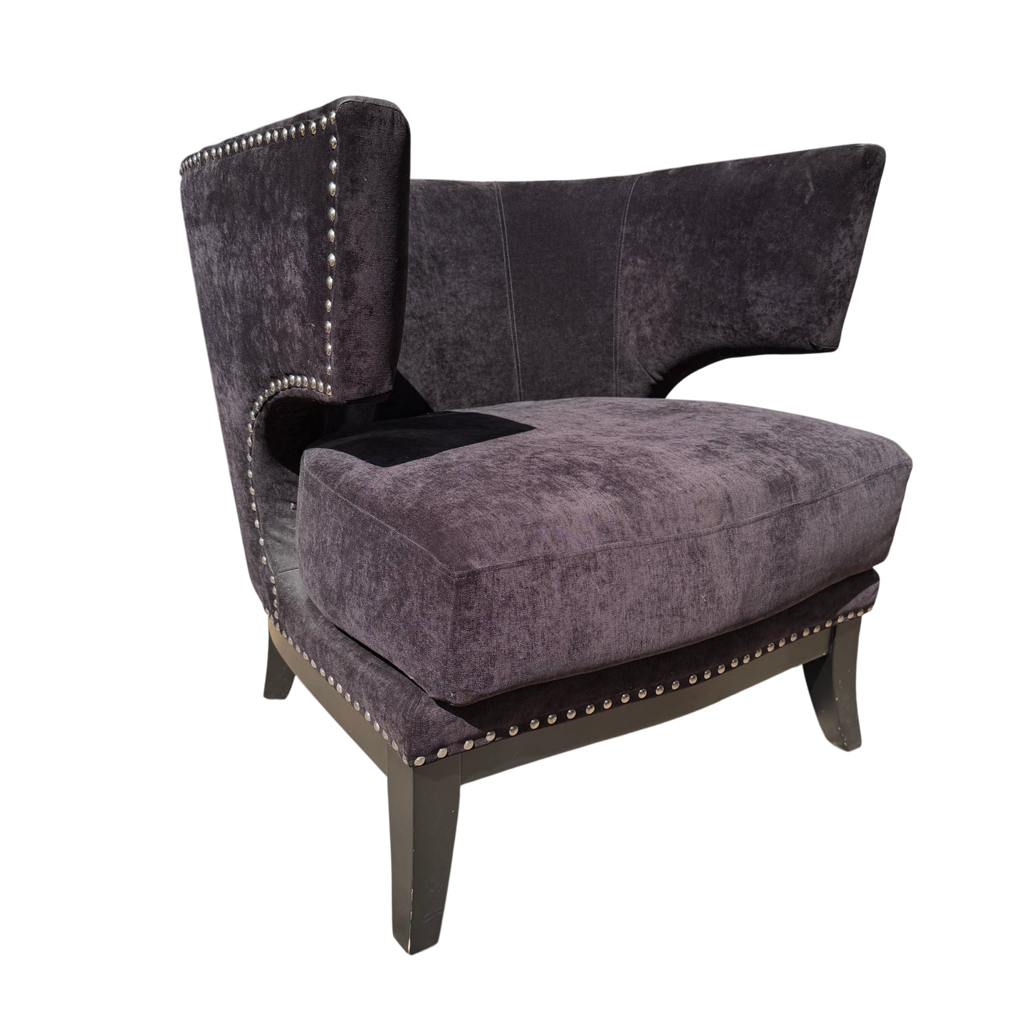 Black upholstered wingback armchair with stud trim and removable cushion on timber legs