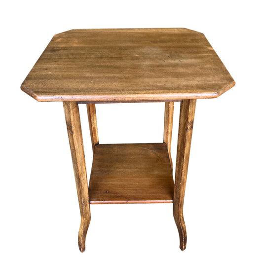 Arts & Crafts three-tier hall table with octagonal top and slender vertical legs in medium brown oak finish