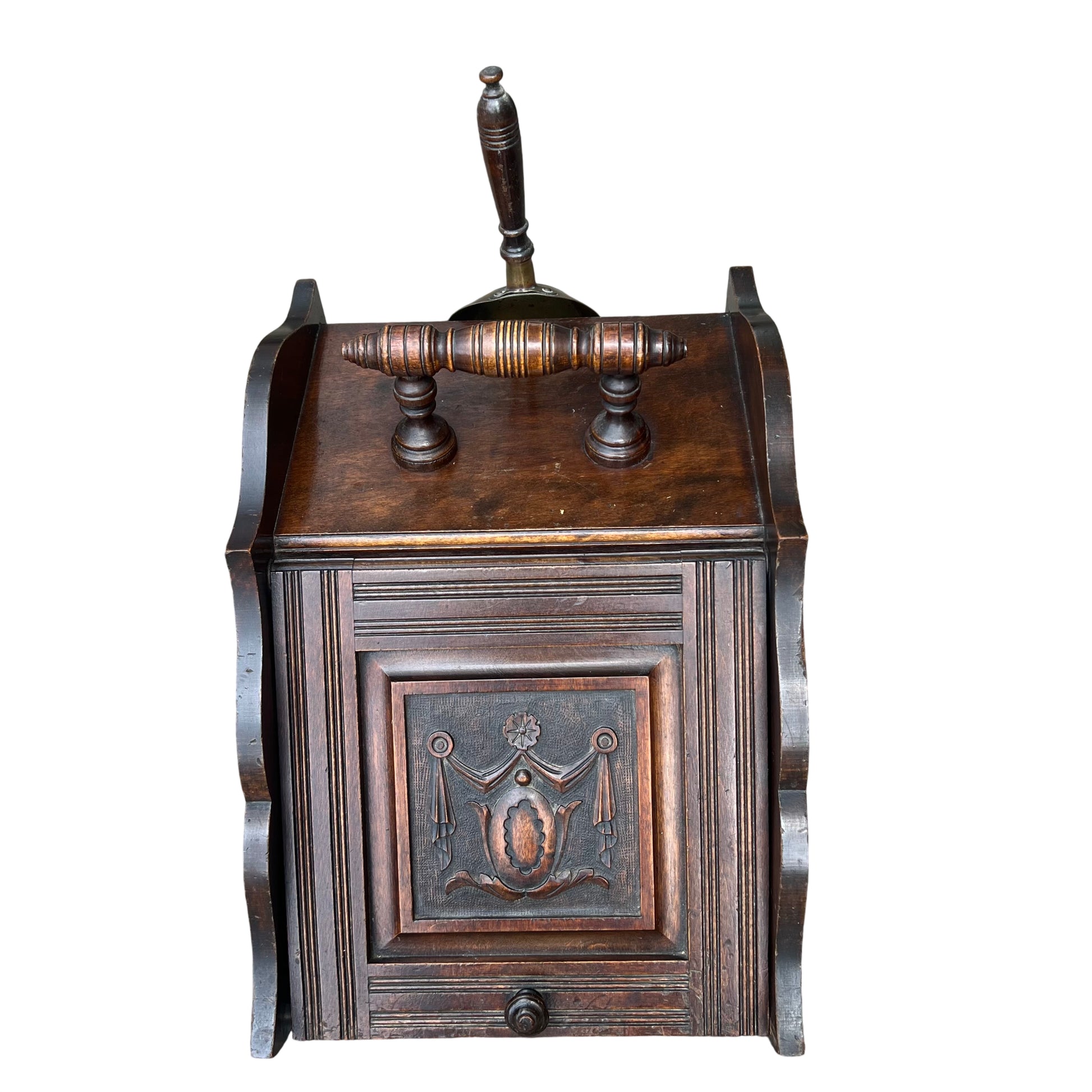 Carved wooden coal hod with moulded panel and decorative draped motif on front