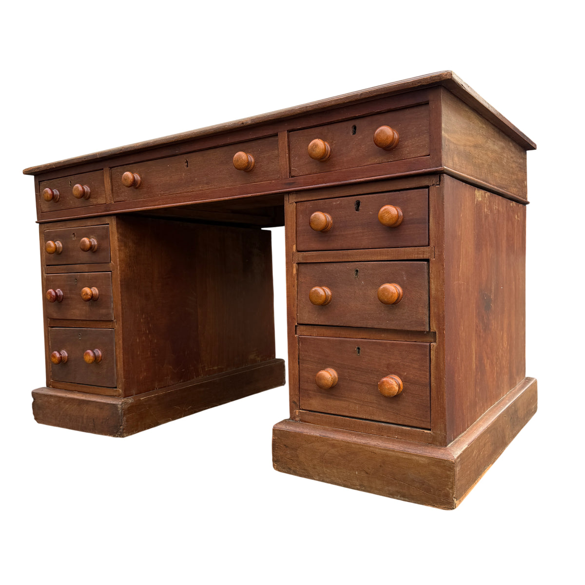 Antique-style mahogany pedestal desk with nine drawers and inset leather writing surface
