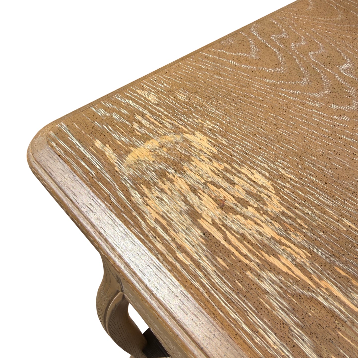 Scalloped apron detail and curved leg profile on contemporary bedside table