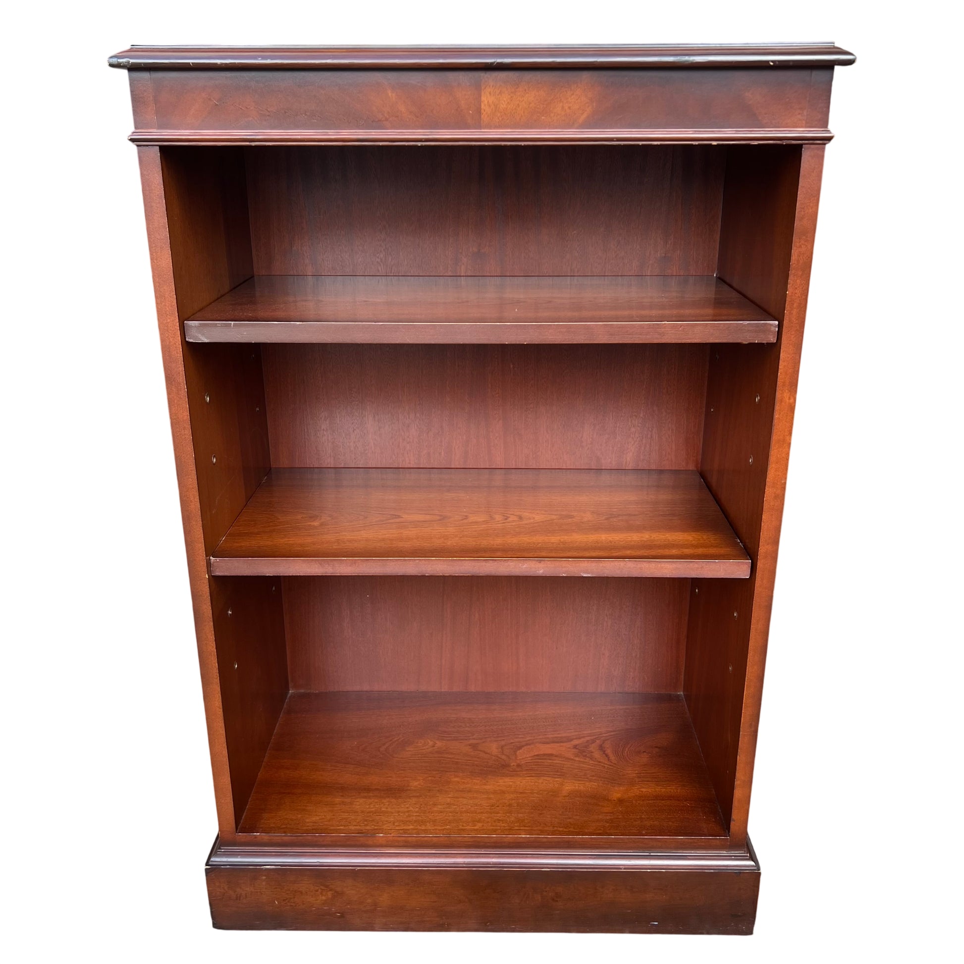 Front view mahogany veneer bookcase by Brights of Nettlebed with three shelves