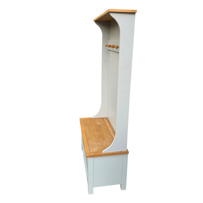 Painted bench leg and base with visible panelled construction and floor clearance