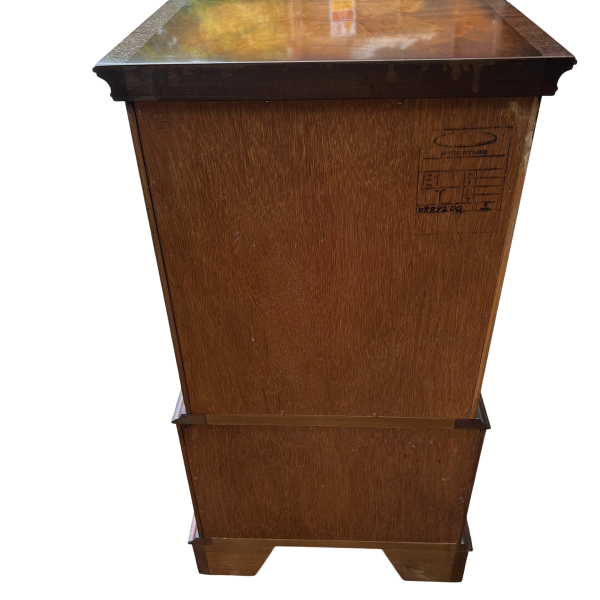 Top-down view of the chest top with visible scratches and faded finish