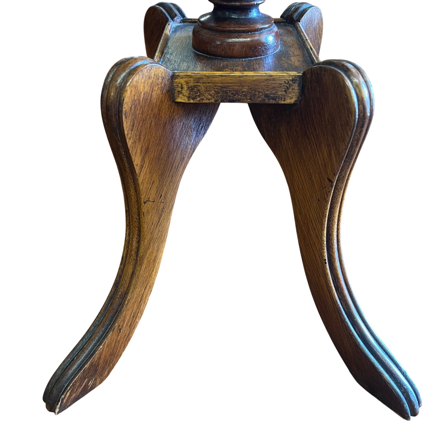 Tripod splayed feet and carved supports on a Victorian pedestal table base