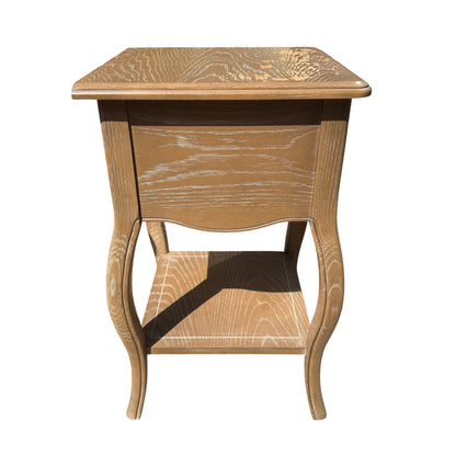 Lower shelf and stretcher visible between legs of bedside cabinet