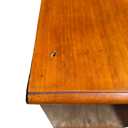 Lower section and bun feet of a Victorian pine chest of drawers