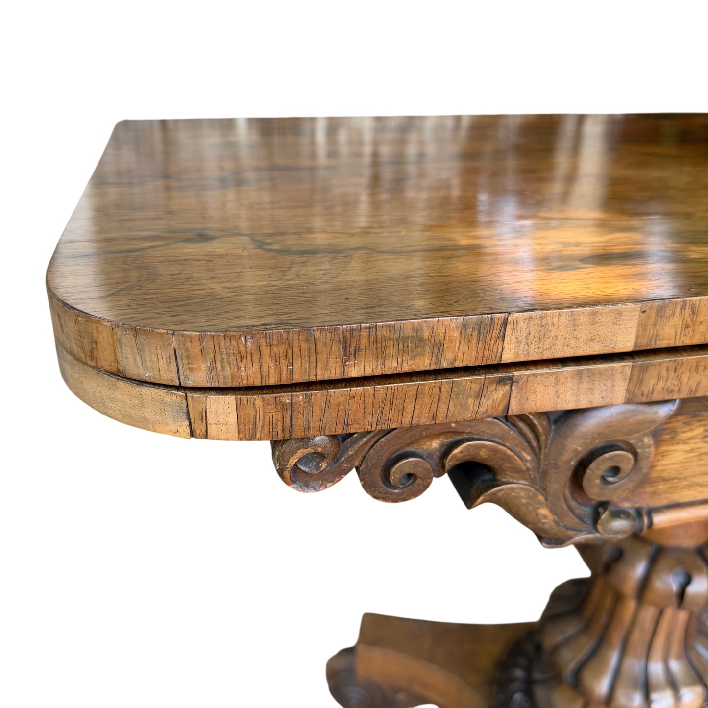 Top surface of Victorian card table showing figure in the rosewood veneer