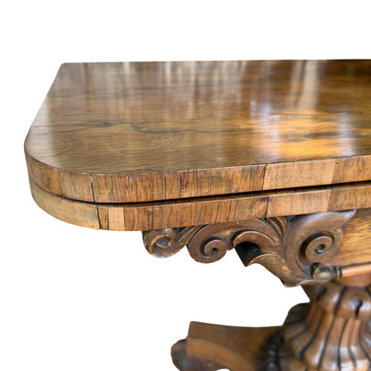 Top surface of Victorian card table showing figure in the rosewood veneer